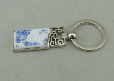 Сплав цинка 1,5 дюймов рекламируя Keychains при введенная часть фарфора