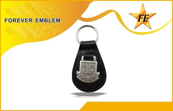 Неподдельный, PU, PVC кожаное выдвиженческое Keychains с изготовленным на заказ логосом металла